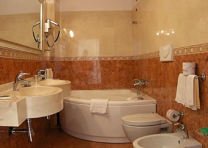 Отель Santa Lucia Le Sabbie D'oro 4*